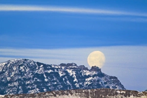 Moon Set Prints: Full moon sets over Mount Cecelia near Cascade Montana