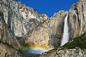 Moonbow and starry sky over Yosemite Falls, Yosemite National Park, California, USA
