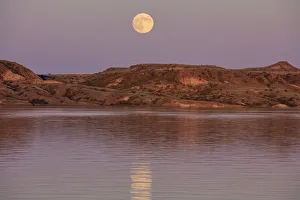 Badland Prints: Full moonrise over Fort Peck Reservoir in the Charles M Russell National Wildlife