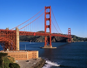 Golden Prints: Morning light bathes the Golden Gate Bridge & Fort Point