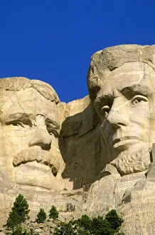 Morning light on Lincoln and Roosevelt detail, Mount Rushmore National Memorial, South Dakota, USA