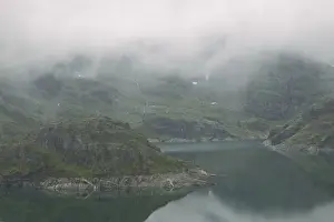 Nordic Prints: Morning mist rises above a receding glacial a lake below Folgfonna Glacier, above