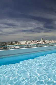 Images Dated 26th March 2006: MOROCCO, Atlantic Coast, ESSAOUIRA: Town and Pool View from Hotel L Heure Bleue