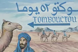 Images Dated 16th March 2006: MOROCCO, Draa Valley, ZAGORA: Famous sign of Timbouctou 52 jours camel caravans