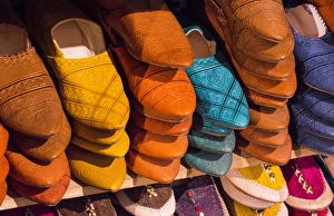 Images Dated 2028: Morocco Fez colorful arab shoes for sale in store on rack