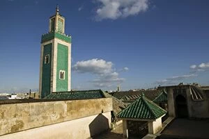 MOROCCO, Meknes: Exterior View of the Grande Mosque Minaret from the Medersa Bou Inania