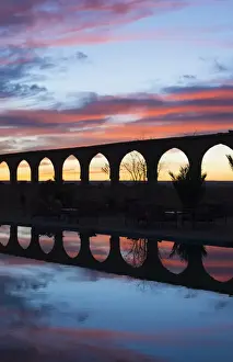 Images Dated 2028: Morocco Sahara Desert sunset color on arches and water Las Palmeras area