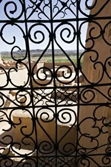 Images Dated 15th March 2006: MOROCCO, South of the High Atlas, OUARZAZATE: Taourirt Kasbah viewed through lattice