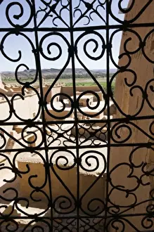 MOROCCO, South of the High Atlas, OUARZAZATE: Taourirt Kasbah viewed through lattice