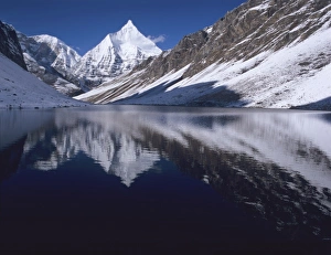 Adventure Travel Prints: Mount Jichu Drake reflected in Sophu lake, Jigme Dorji National Park, Bhutan