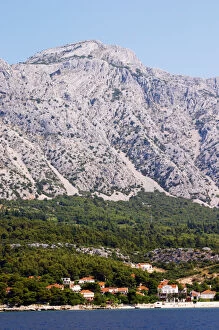 Images Dated 9th July 2006: Mountain top of the Mount Sveti Ilija, with white rock formations. At sea level the Orebic village