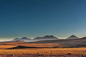 Vast Prints: Mountain peaks and desert landscape seen from the road to Paso Sico