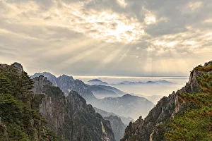 Mountain peaks and mist from above at sunrise, Yellow Mountain or Huangshan