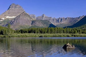 Mountains reflected in Lake. Glacier National Park. Montana. USA