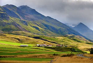 Nordurland Eystra Prints: Mountains towering over Oxnadalur with road climbing up to Oxnadalsheidi. Europe, Iceland