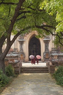 Myanmar, Bagan. Novice monks in front of temple