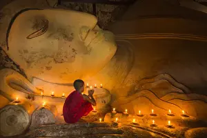 Buddhism Prints: Myanmar, Bagan. Young monk at Shinbinthalyaung Temple Reclining Buddha