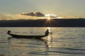 Fisherman Prints: Myanmar, Inle Lake. Fisherman at sunset on Inle Lake
