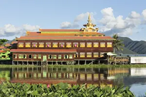 Images Dated 30th October 2013: Myanmar, Inle Lake. Nga Phe Chaung Kyaung Monastary reflected in Inle Lake