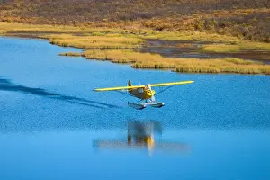 Plane Prints: N. A. USA, Alaska. Float plane on lake along the Denali Highway