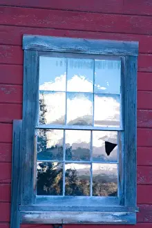 Wrangell Mountains Prints: N. A. USA, Alaska. A reflection of the Wrangell Mountains in the window of the historic