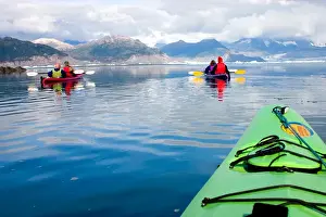 Sound Prints: N. A. USA, Alaska. Tourists kayaking in and around Columbia Glacier