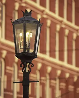 Lamp Post Prints: N. A. USA, Texas, Galveston Stuart Building (1882) and gaslight lampost at sunset