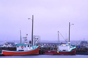 N.A. Canada, Nova Scotia. Lobster boats on a foggy, rainy day