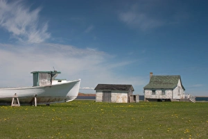 Images Dated 19th January 2005: NA, Canada, Prince Edward Island. House, shed and dry dock lobster boat near Malpeque