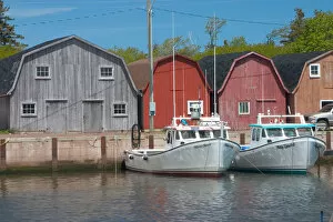 Images Dated 19th January 2005: NA, Canada, Prince Edward Island, Malpeque Harbour. Fish sheds and lobster boats