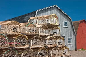 Images Dated 19th January 2005: NA, Canada, Prince Edward Island, Malpeque Harbour. Lobster pots and fish sheds