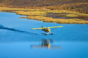 N.A. USA, Alaska. Float plane on lake along the Denali Highway