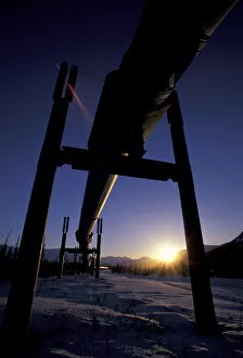 Images Dated 11th March 2004: NA, USA, Alaska, north slope of Brooks Range A winter sun sets over the Trans-Alaska