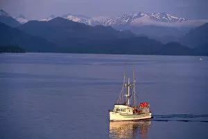 NA, USA, Alaska, Sitka, A fishing boat returns to Sitka; Baranof Island behind