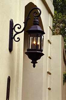 N.A. USA, Georgia, Savannah. Lantern near doorway