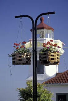 Images Dated 10th May 2004: NA, USA, Washington, Mukilteo Hanging flower baskets and the Mukilteo Lighthouse
