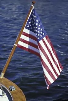 Lake Union Prints: NA, USA, Washington, Seattle American flag on boat in Lake Union