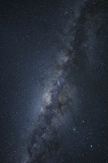 Namibia. The Milky Way galaxy rises overhead in Sossusvlei region