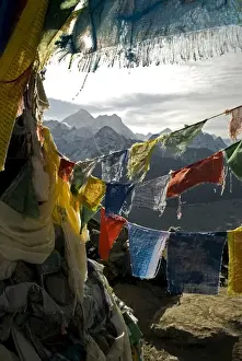Images Dated 28th April 2011: Nepal, Gokyo Ri. Prayer flags on the summit of Gokyo Ri in the Everest region of