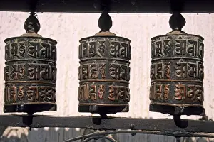 Tibetan Prints: Nepal, Kathmandu. Buddhist prayer wheels at Swayambhunath Monkey Temple