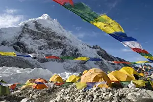 Adventure Prints: Nepal, Mount Everest. The tents of mountaineers are scattered along the Khumbu Glacier