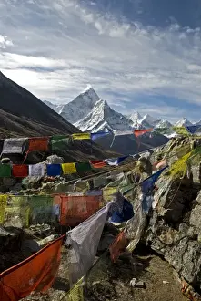 Himalaya Prints: Nepal. Prayer flags are hung along the Everest Base Camp Trail with the peak of Ama