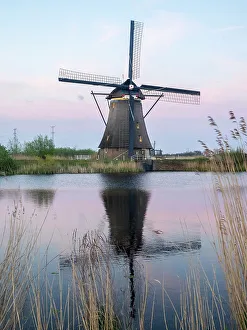 Images Dated 9th January 2023: Netherland, Kinderdijk. Windmills along the canal