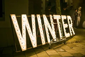 North Holland Prints: Netherlands, Amsterdam, signs for the Winter Parade, evening