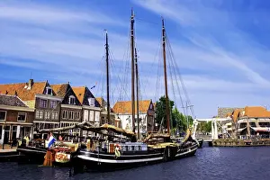 Miva Stock Prints: Netherlands, Hoorn, Old wooden sailboats moored along the banks