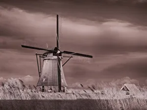 Windmill Prints: Netherlands, Kinderdijk. Windmills at sunset in Kinderdijk