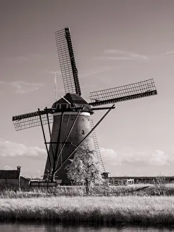 Images Dated 3rd February 2021: Netherlands, Kinderdijk. Windmills at sunset in Kinderdijk