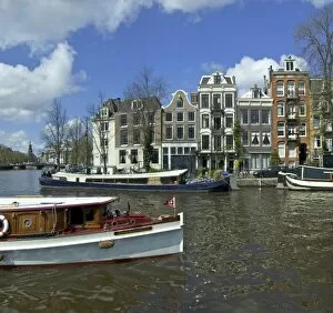 Images Dated 15th April 2008: Netherlands, North Holland, Amsterdam, Canal boats at River Amstel and the Zwanenburgwal