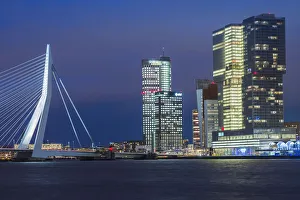 Images Dated 22nd December 2015: Netherlands, Rotterdam, Erasmusbrug bridge and new commerical towers at the renovated docklands