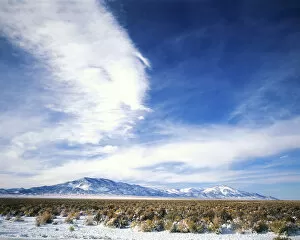 NEVADA. USA. Cirrus clouds above Spring Valley & Schell Creek Range in early winter